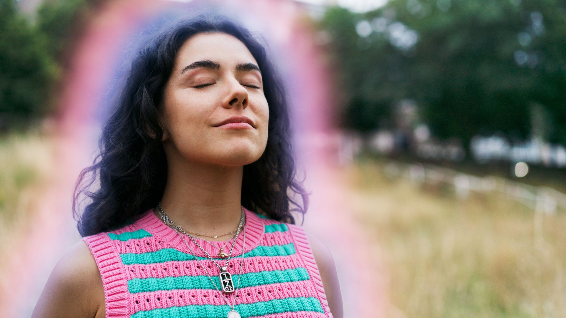 A woman with her aura glowing around her