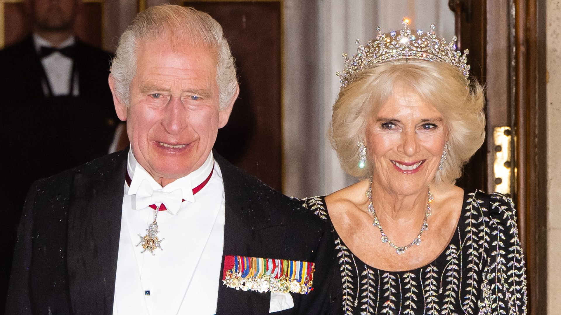 Queen Camilla shines in late Queen's tiara and diamonds for glittering ...