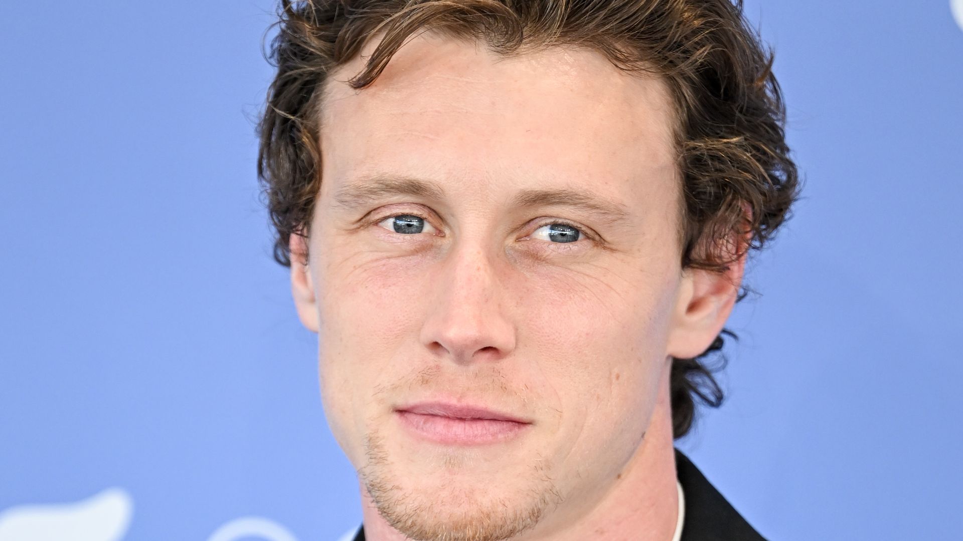 George MacKay attends the "Broken English" photocall during the 82nd Venice International Film Festival on August 30, 2025 in Venice
