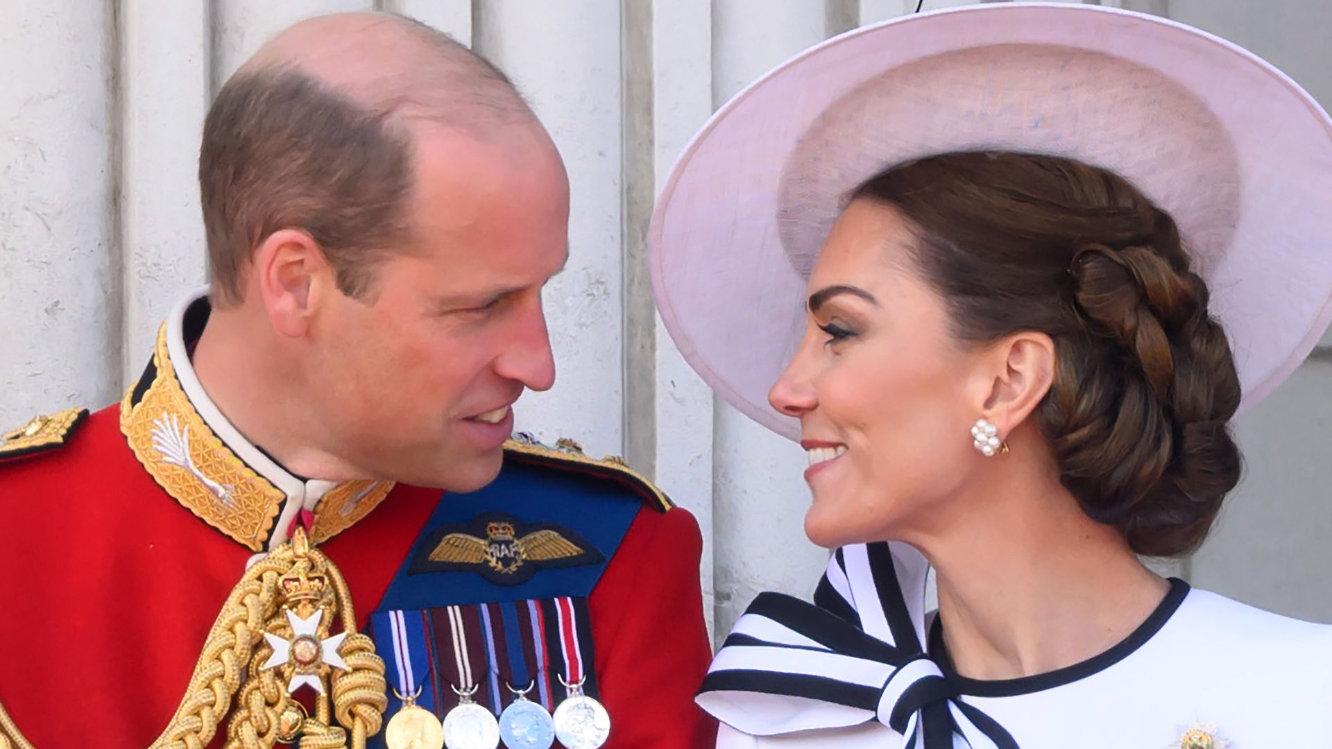 Prince William and kate middleton look at each other