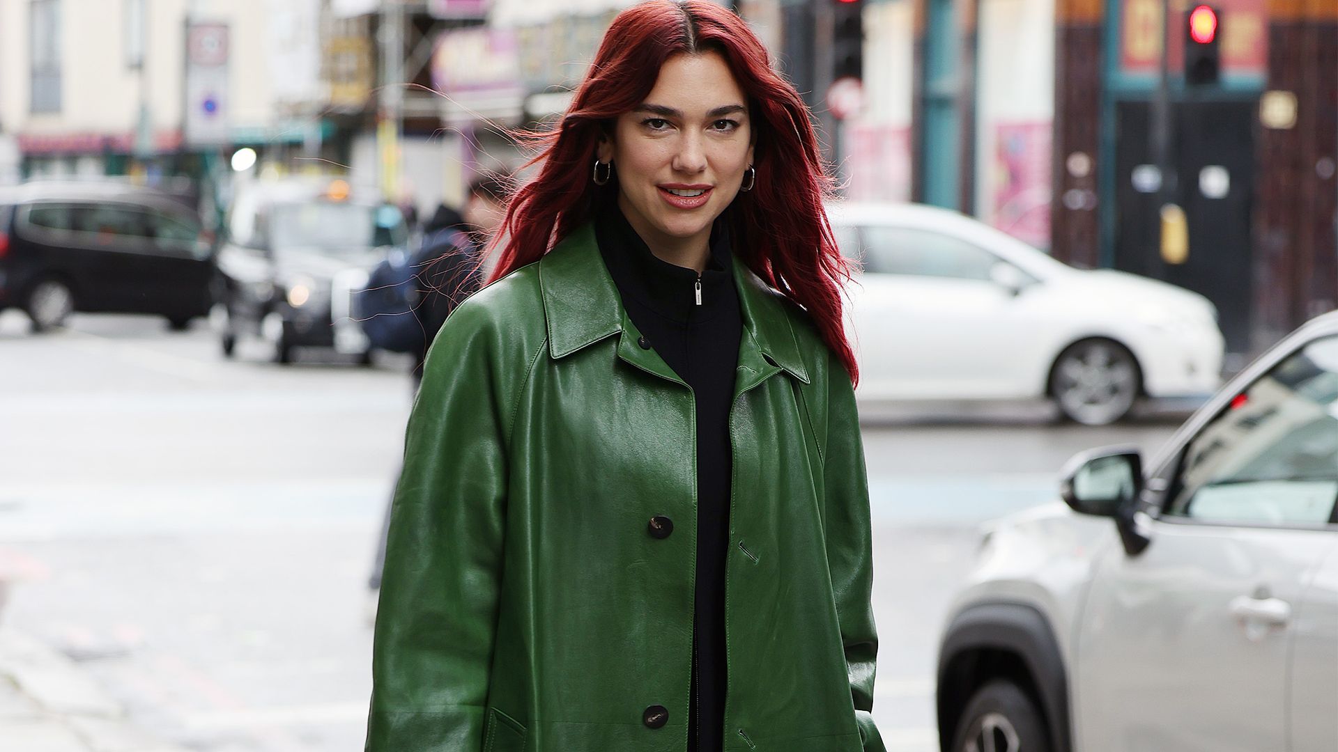 Dua Lipa’s mini jersey dress is peak cool-girl