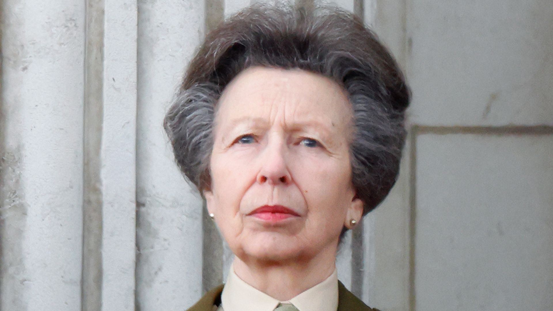 Princess Anne watches a flypast from the balcony of Buckingham Palace