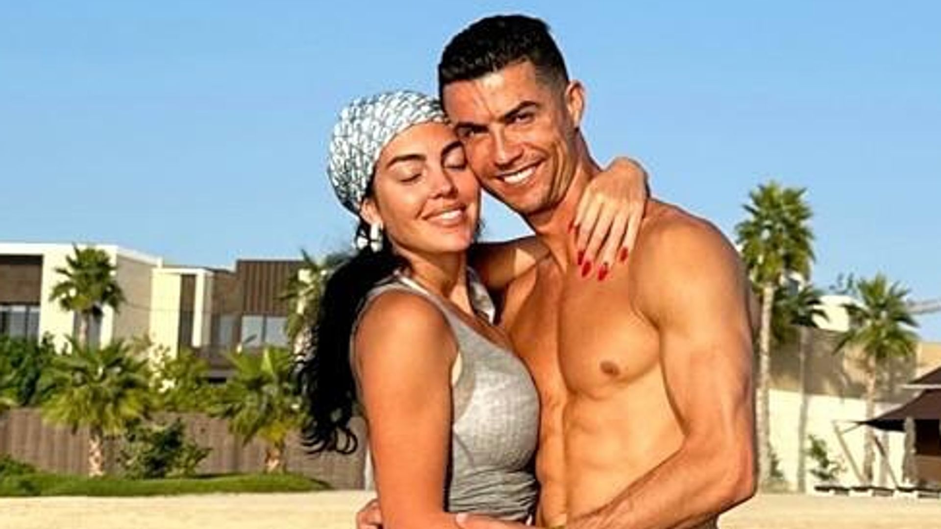 Cristiano Ronaldo poses in shirtless holiday snap alongside bikini-clad model girlfriend Georgina