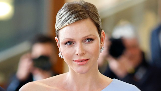 Prince Albert II of Monaco and Princess Charlene pose on red carpet