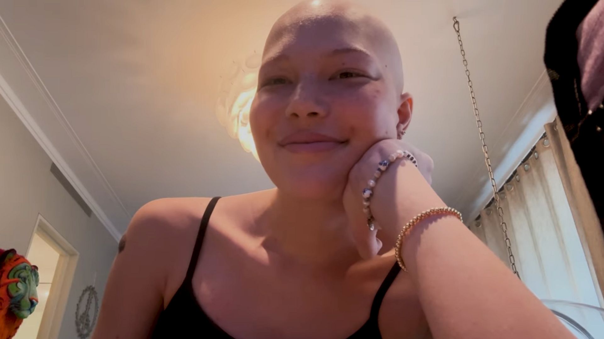 Still from a YouTube video shared by Michael Strahan's daughter Isabella Strahan on April 10, 2024, announcing she only had two more rounds of chemotherapy left