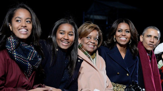 The President Barack Obama and (L-R) daughters Malia and Sasha, mother-in-law Marian Robinson and first lady Michelle Obama look on during the national Christmas tree lighting ceremony on the Ellipse south of the White House December 3, 2015 in Washington, DC. The lighting of the tree is an annual tradition attended by the president and the first family.