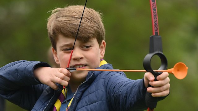 Prince George of Wales tries his hand at archery