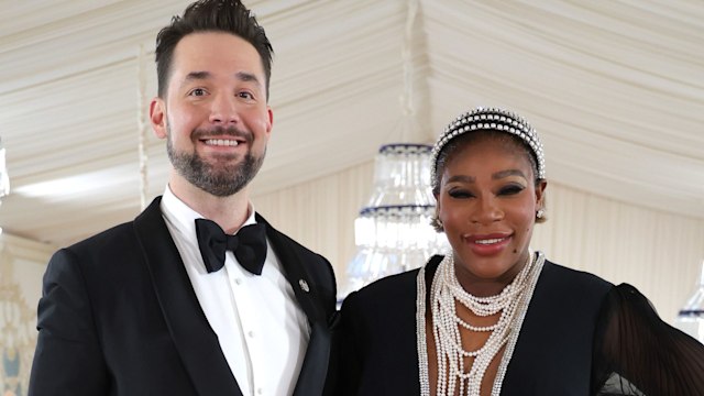Serena Williams and Alexis Ohanian smiling on the red carpet of the Met Gala