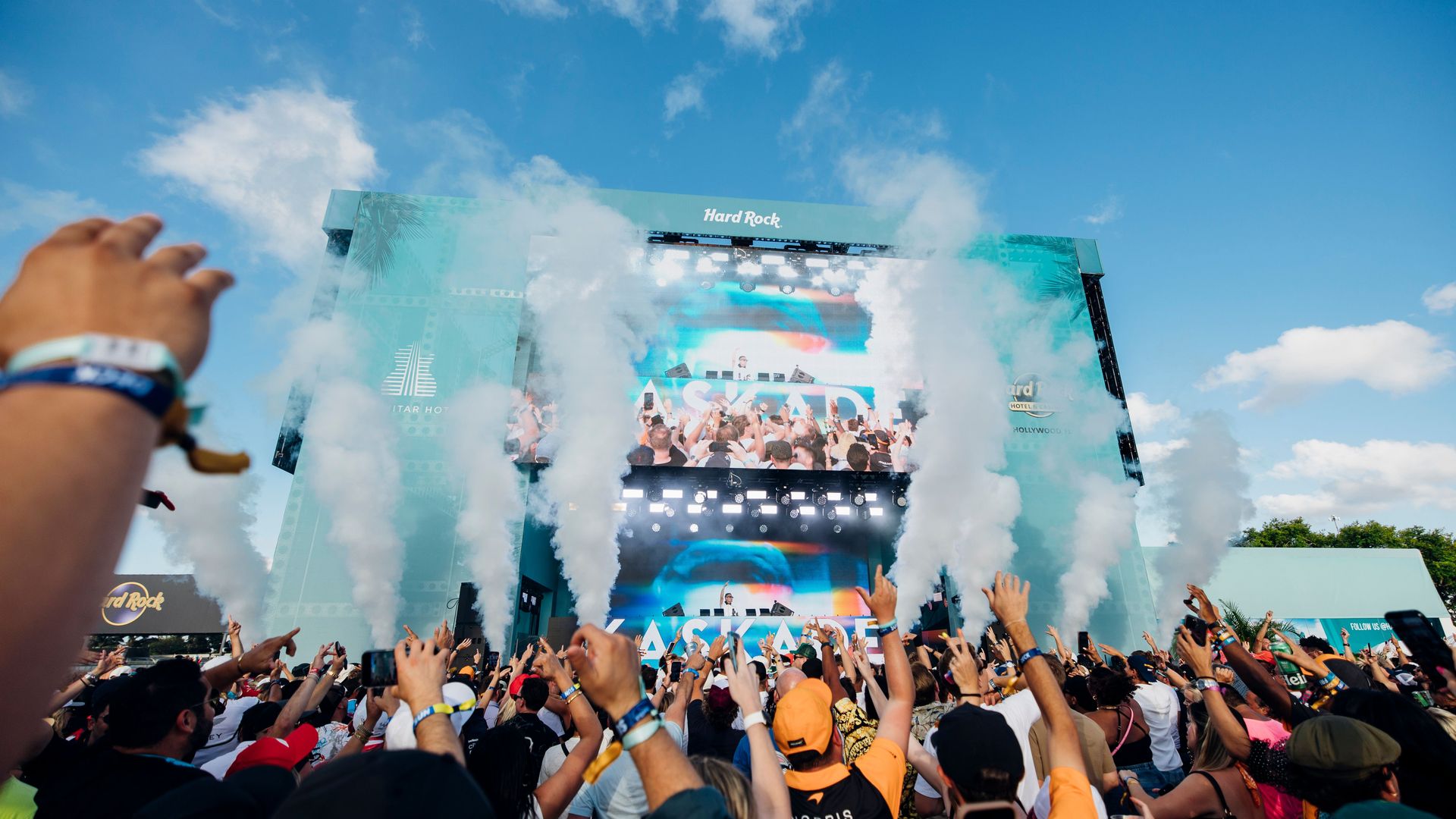 Crowd dancing at a music festival in Hard Rock stadium