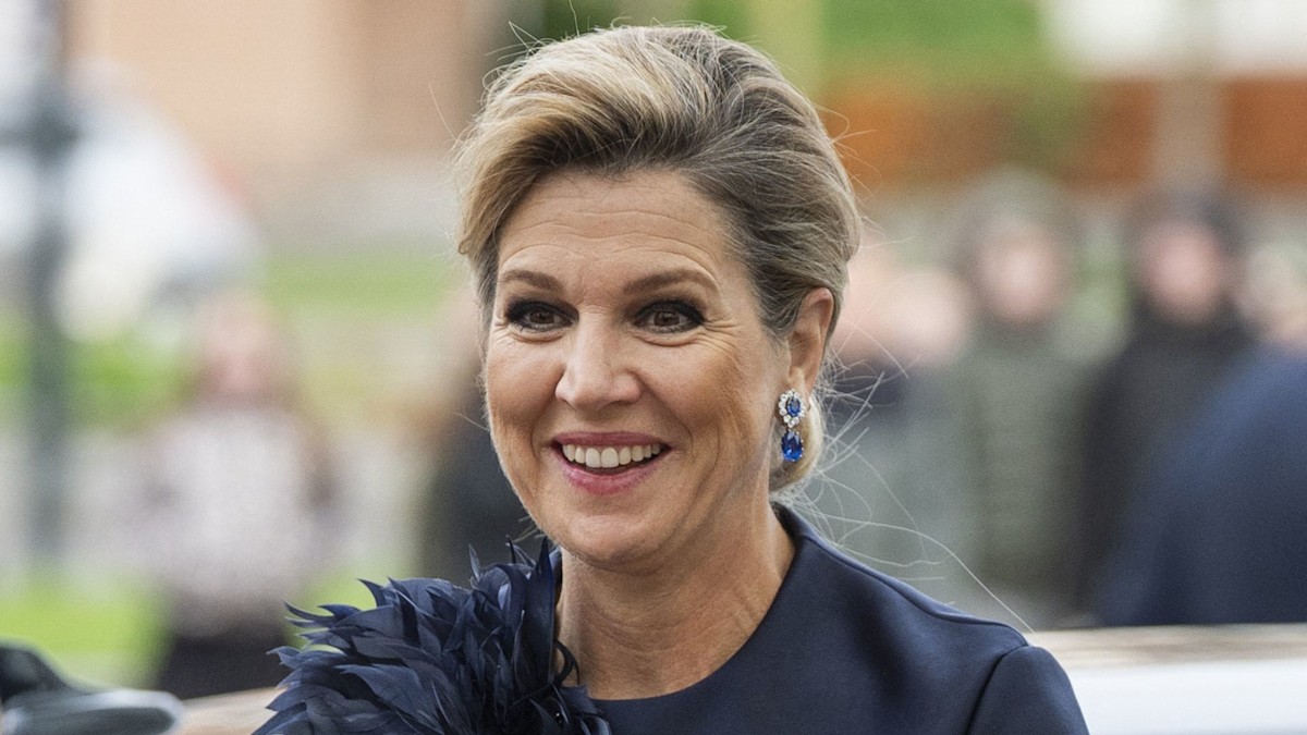How to style satin in your 50s: Queen Maxima's top has a feathered ...