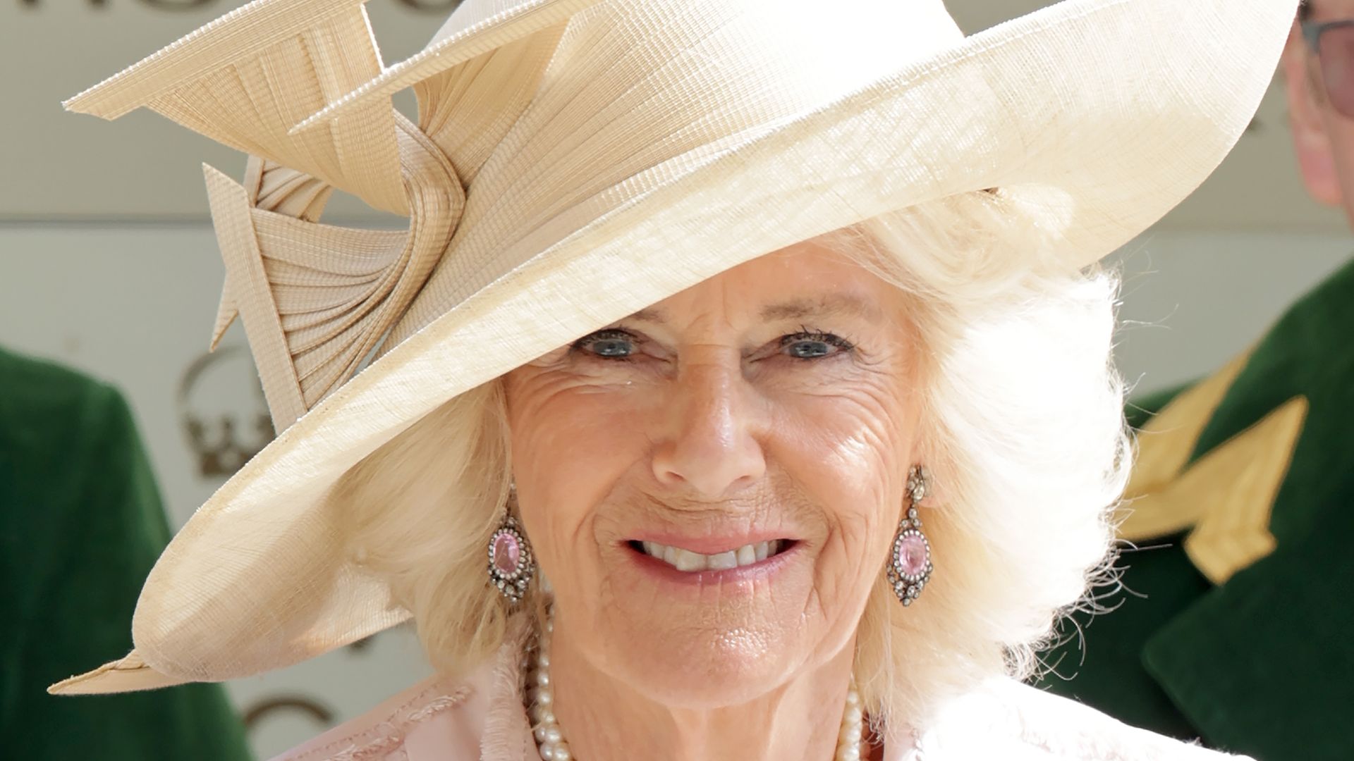 Queen Camilla in light pink hat