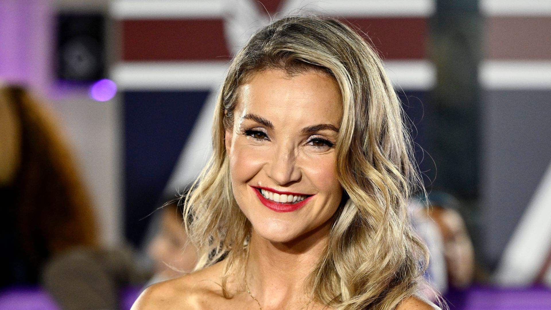  Helen Skelton smiling in white dress