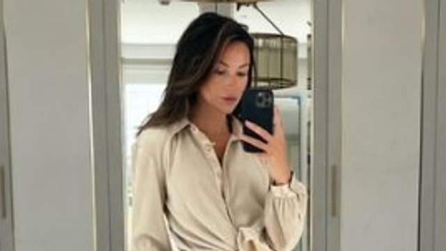 Michelle Keegan in Essex home dressing room taking selfie wearing beige coord