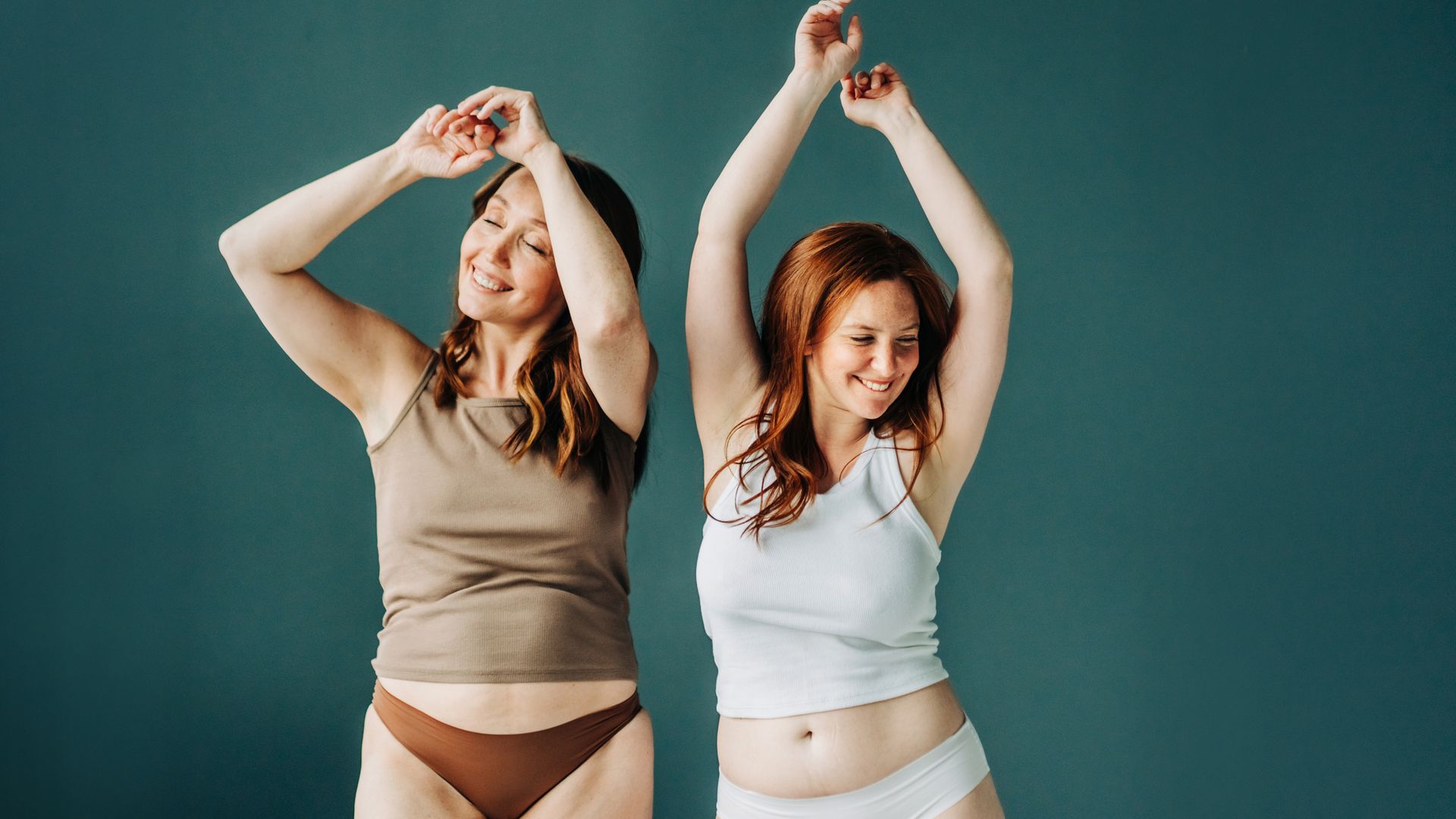 Two females in lingerie and vest with different body shape.