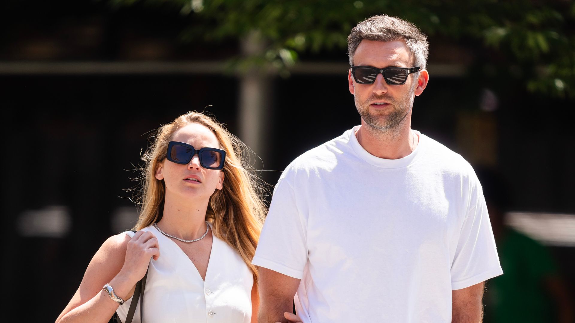 Jennifer Lawrence walking with husband Cooke Maroney