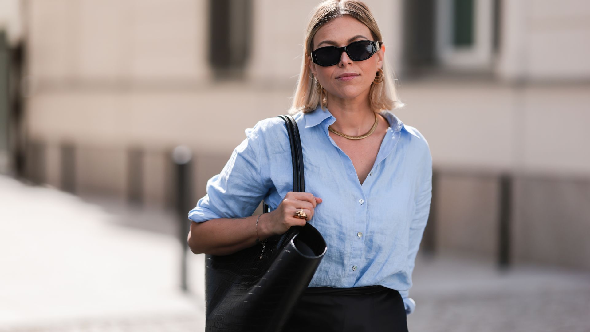 woman carrying a tote bag