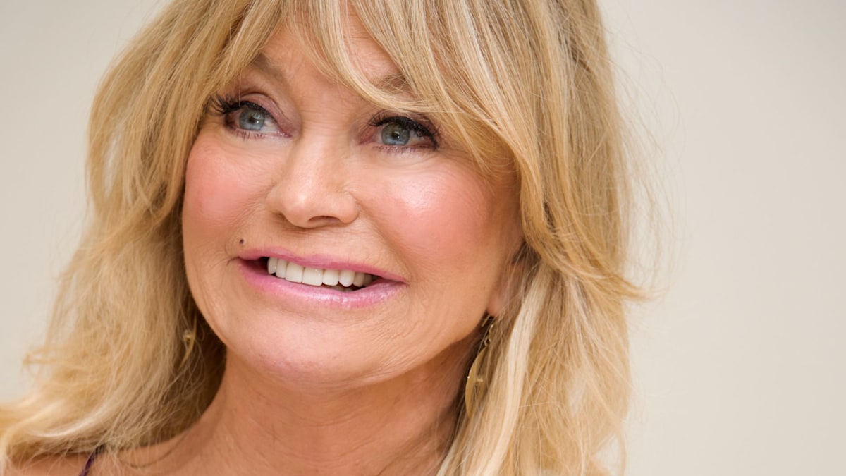 Goldie Hawn poses in bed in unfiltered photo taken from the family archives