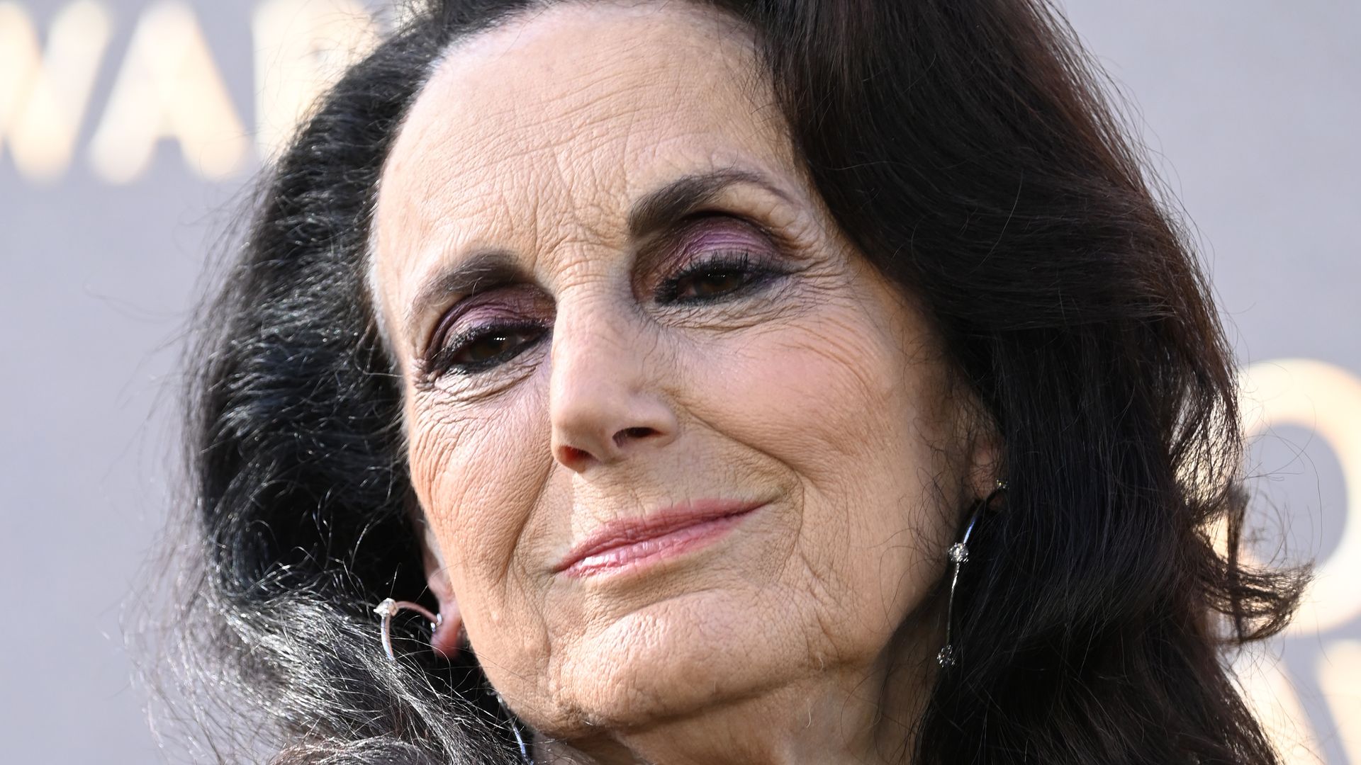Lesley Joseph up close in black dress
