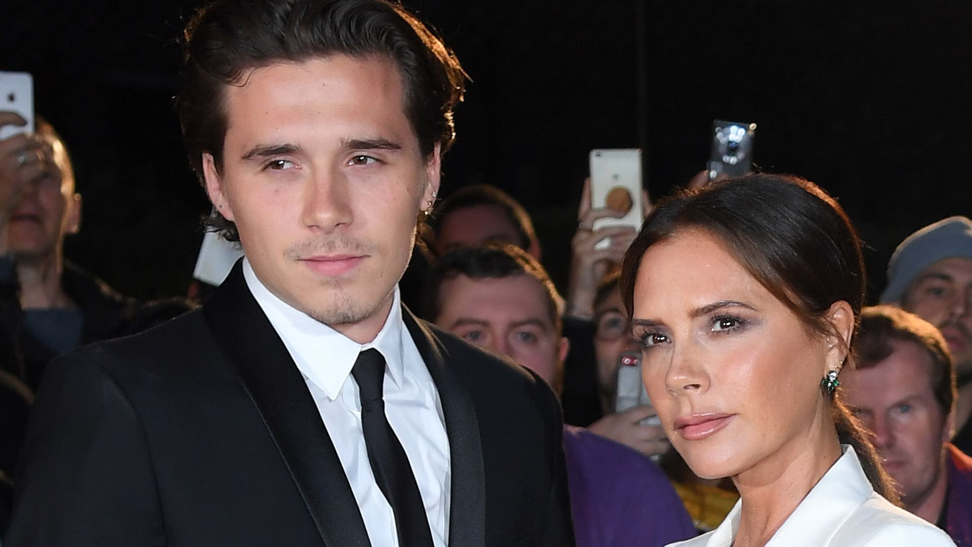 LONDON, ENGLAND - SEPTEMBER 03: Brooklyn Beckham, Victoria Beckham and David Beckham attend the GQ Men Of The Year Awards 2019 at Tate Modern on September 03, 2019 in London, England. (Photo by Karwai Tang/WireImage)