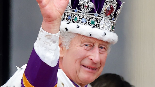 King Charles waving with crown