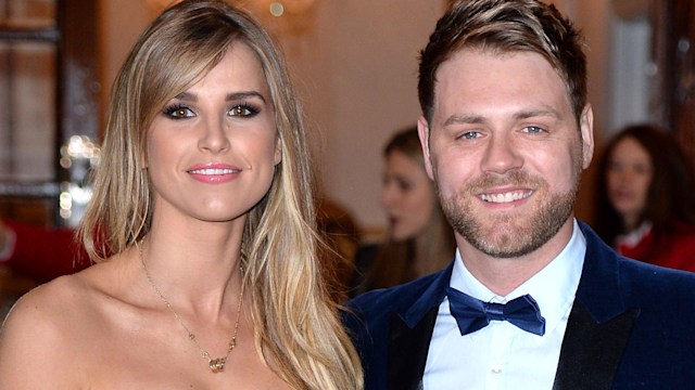 Vogue Williams in a floral strapless dress and Brian McFadden in a velvet suit