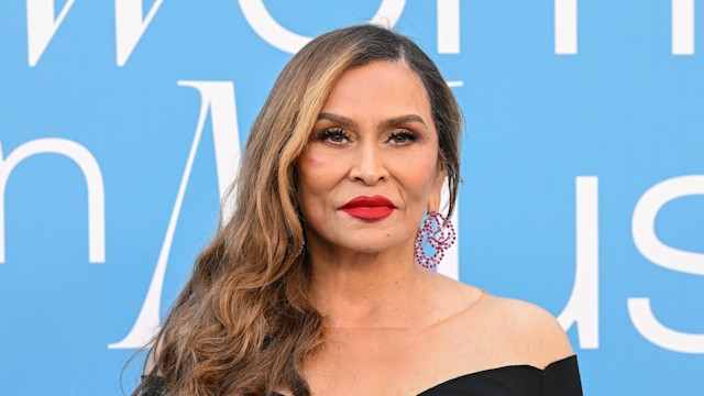 Tina Knowles on the red carpet in black dress