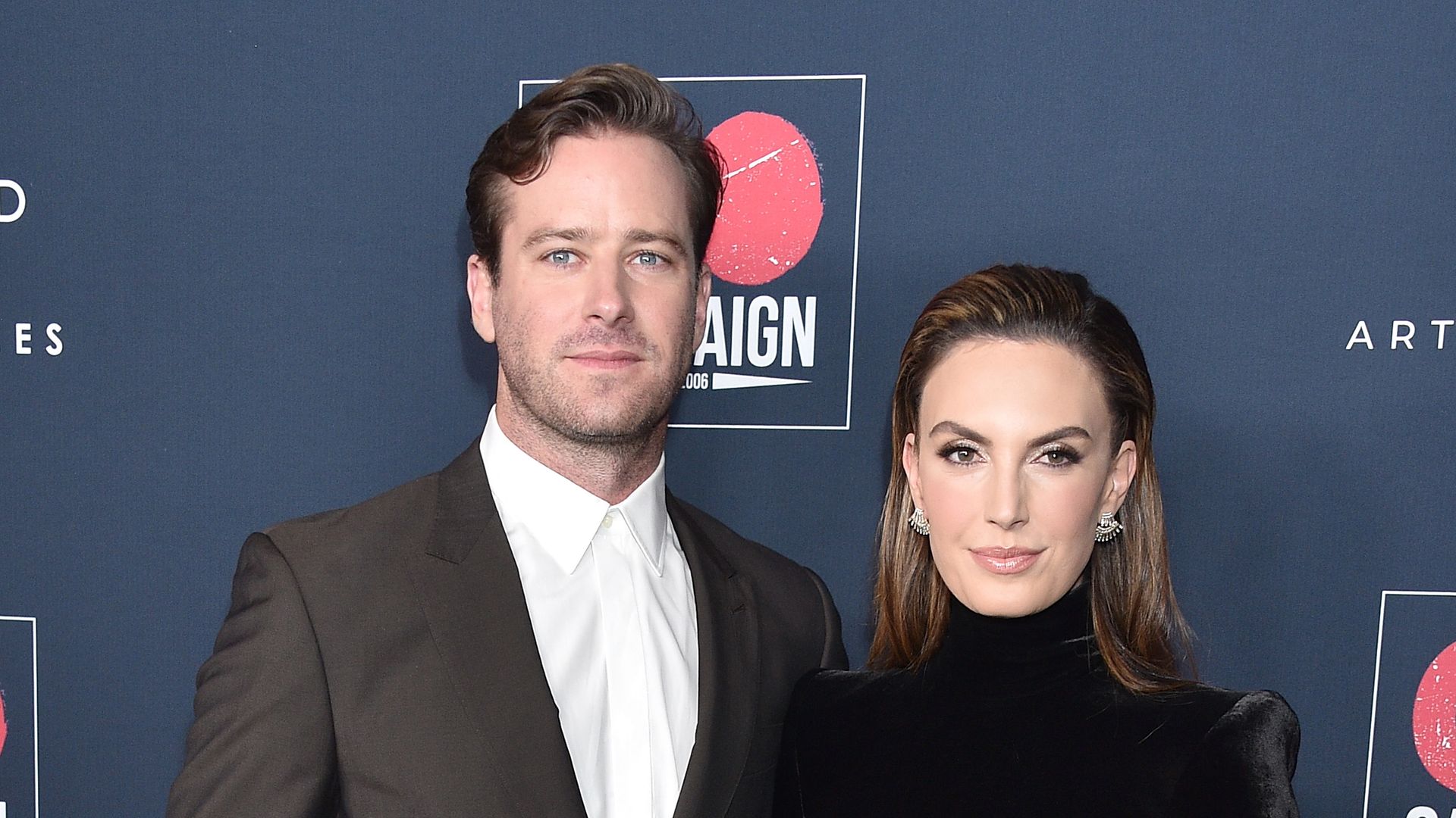 Armie Hammer and Elizabeth Chambers arrive at the Go Campaign's 13th Annual Go Gala at NeueHouse Hollywood on November 16, 2019 in Los Angeles, California