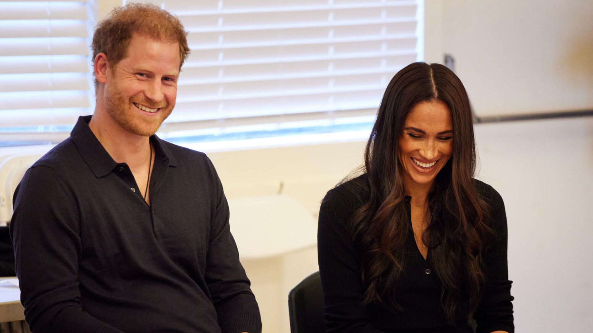 Prince Harry and Meghan Markle at a youth group visit