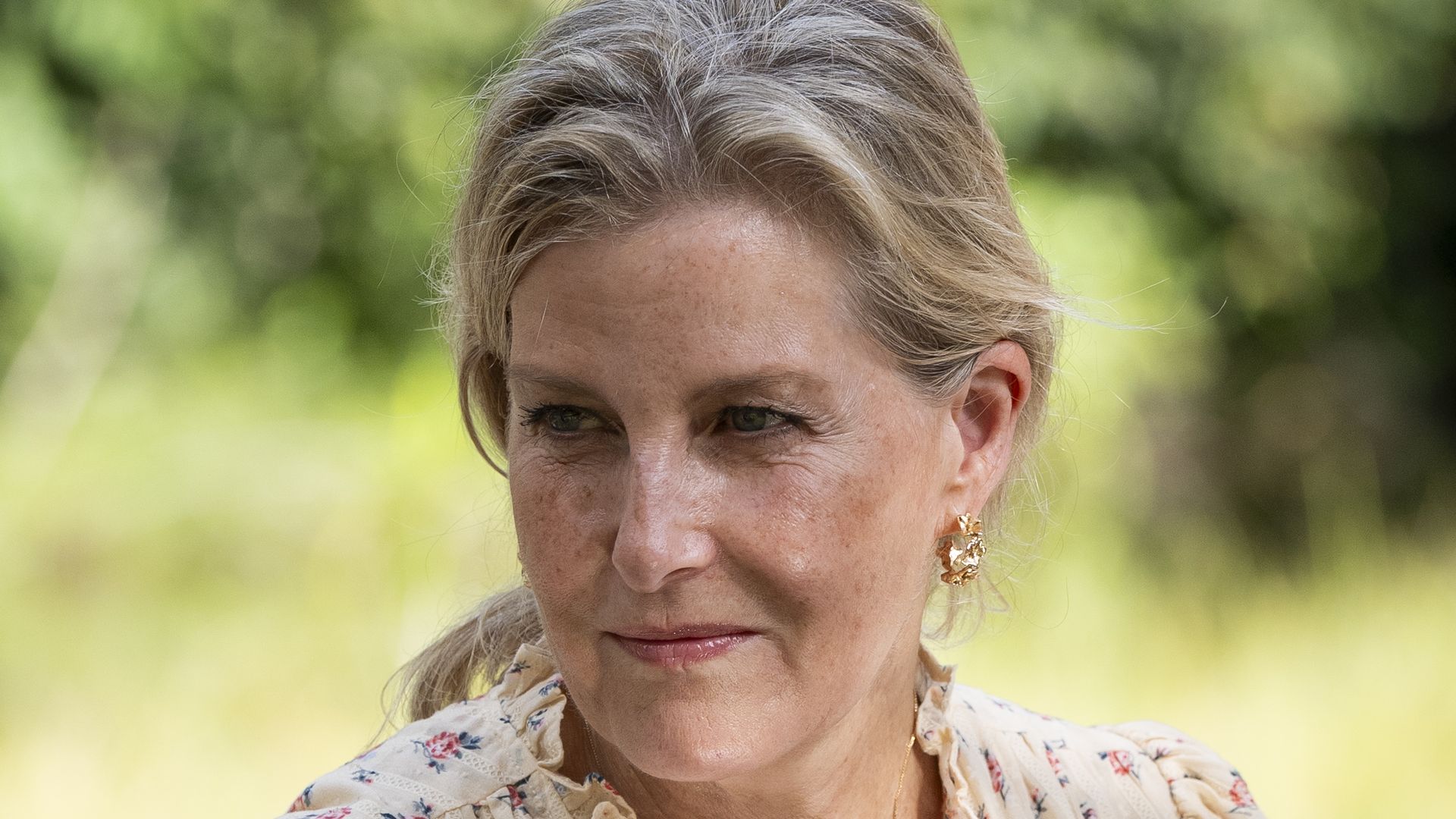 The Duchess of Edinburgh outside in floral blouse