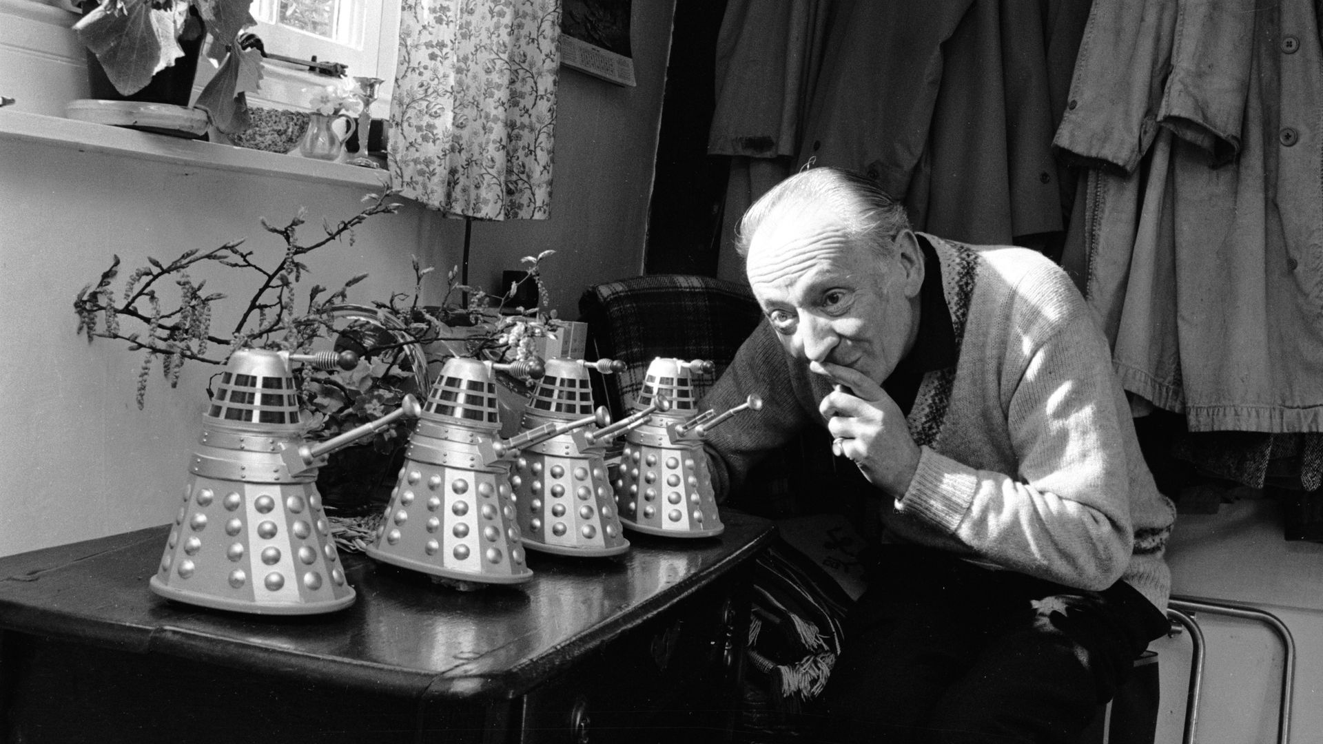 William Hartnell with a group of minature Daleks