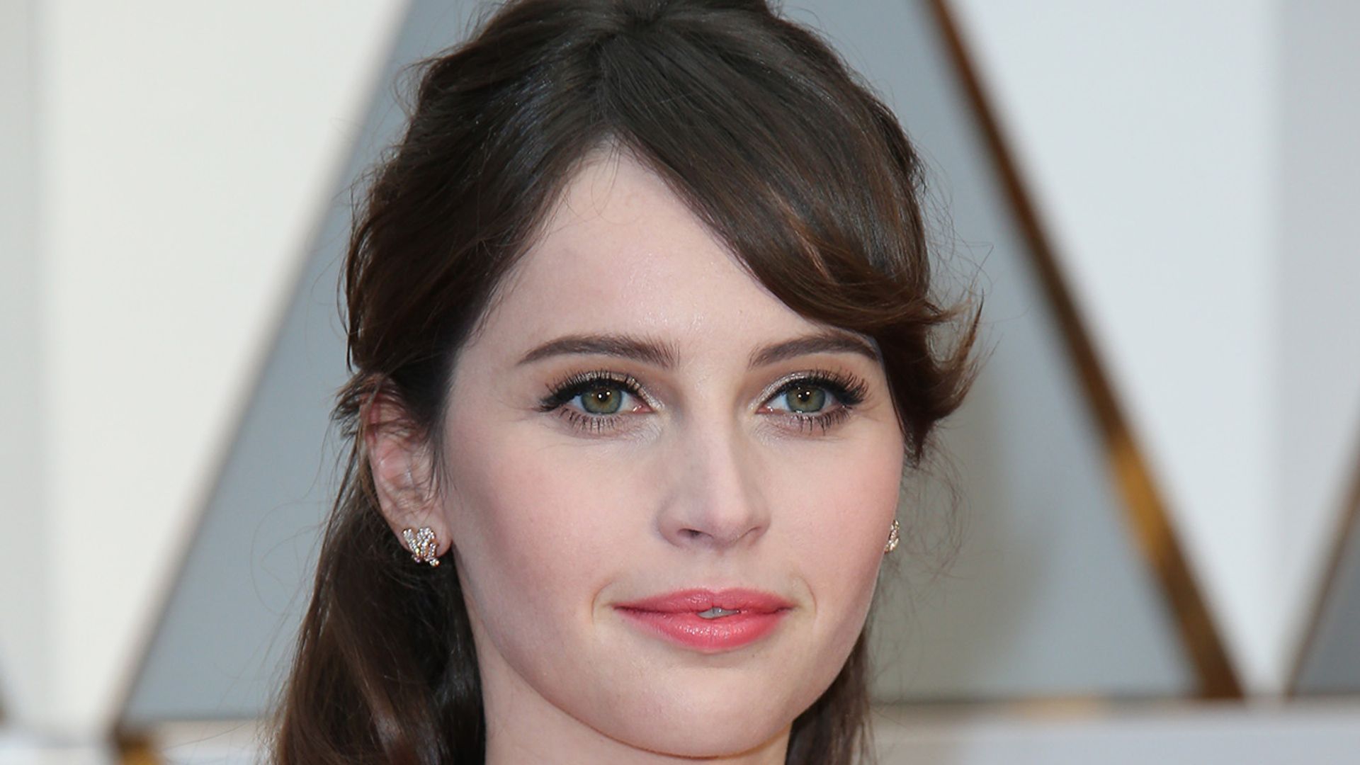 Felicity Jones reveals she is pregnant with her first child - see her growing bump