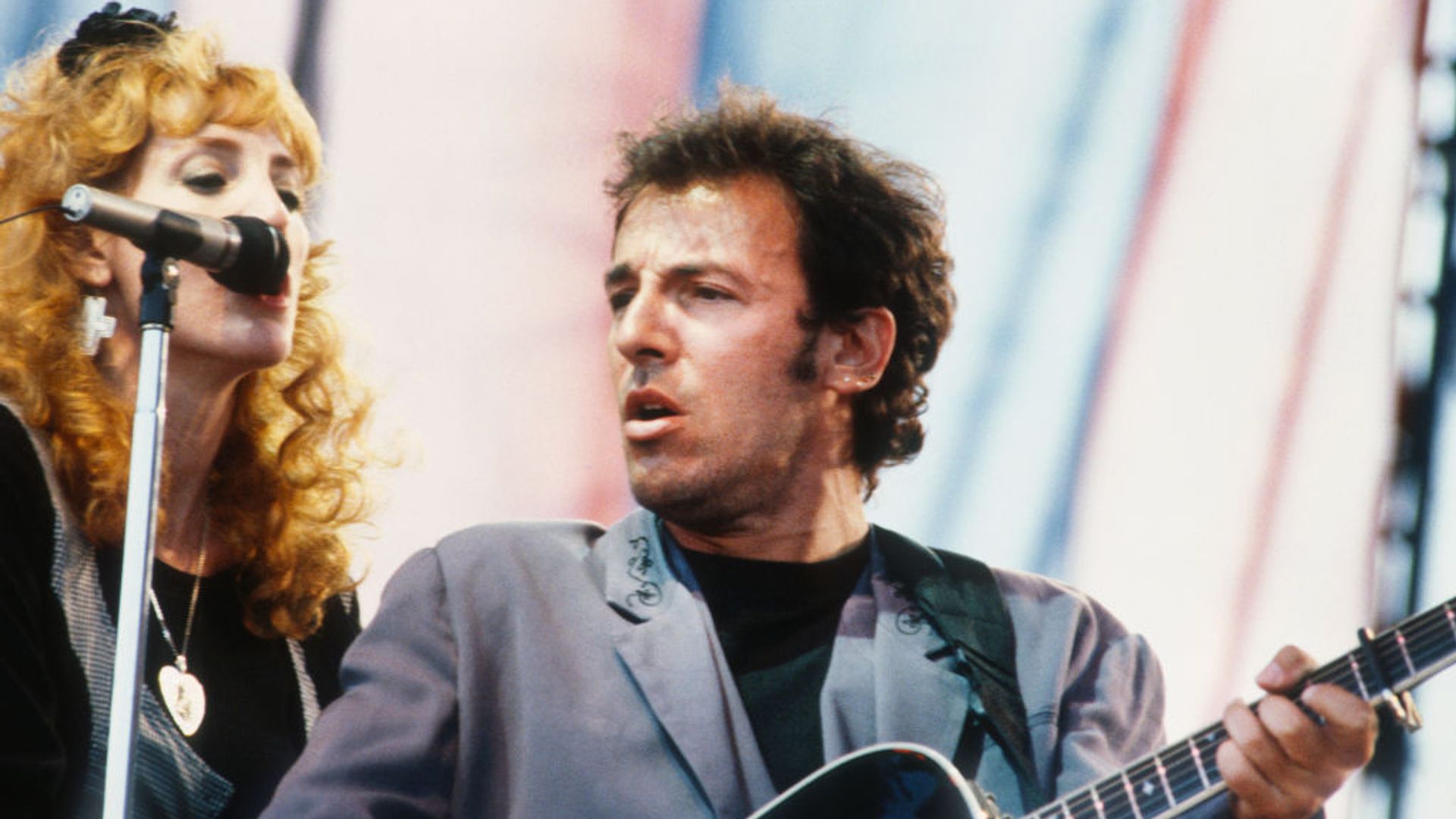 Bruce Springsteen and Patti Scialfa perform on stage