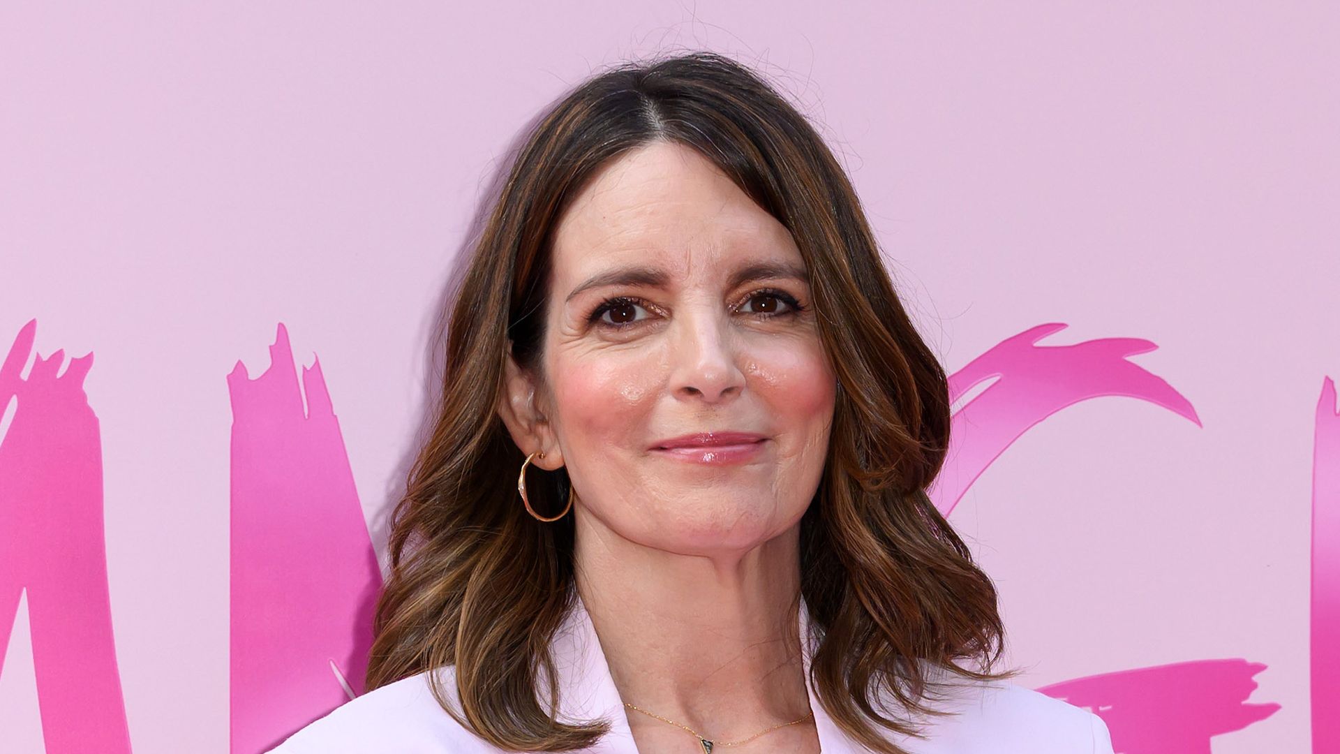 Tina Fey towers over husband on glamorous date night 