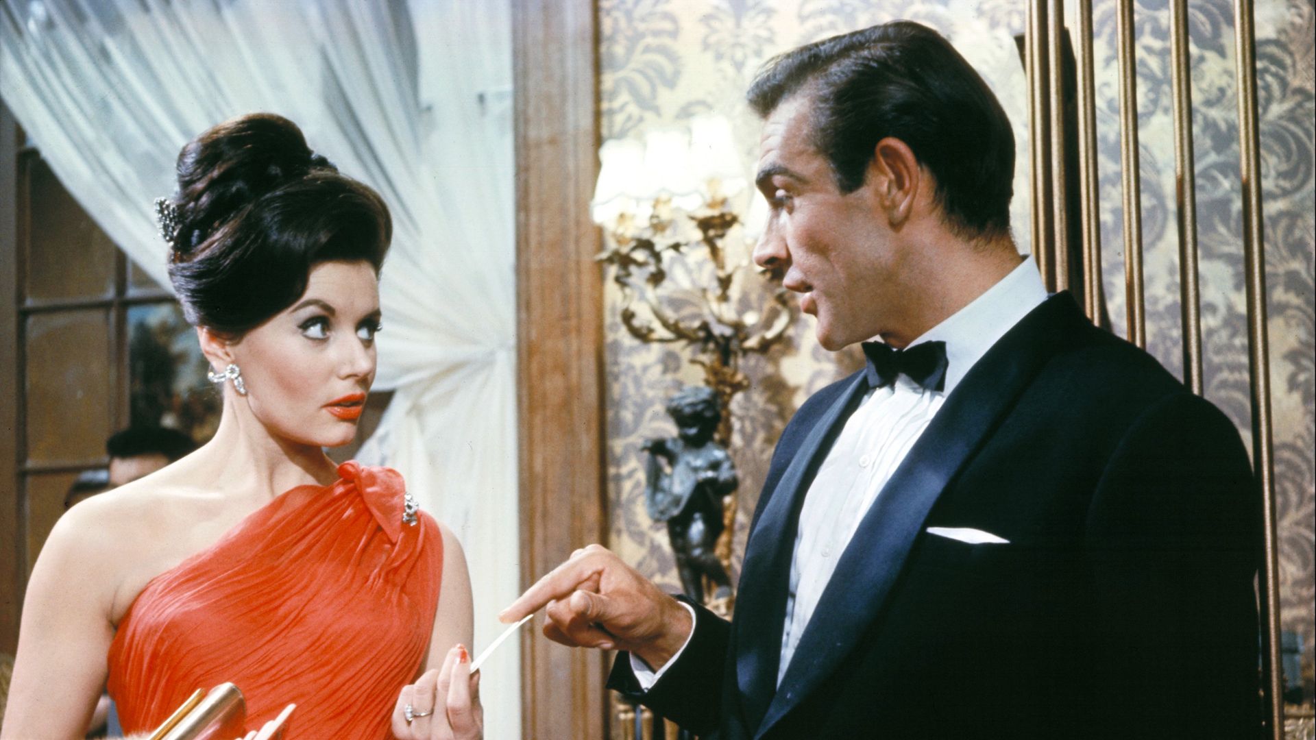 Eunice Gayson and Sean Connery in a scene from Dr. No