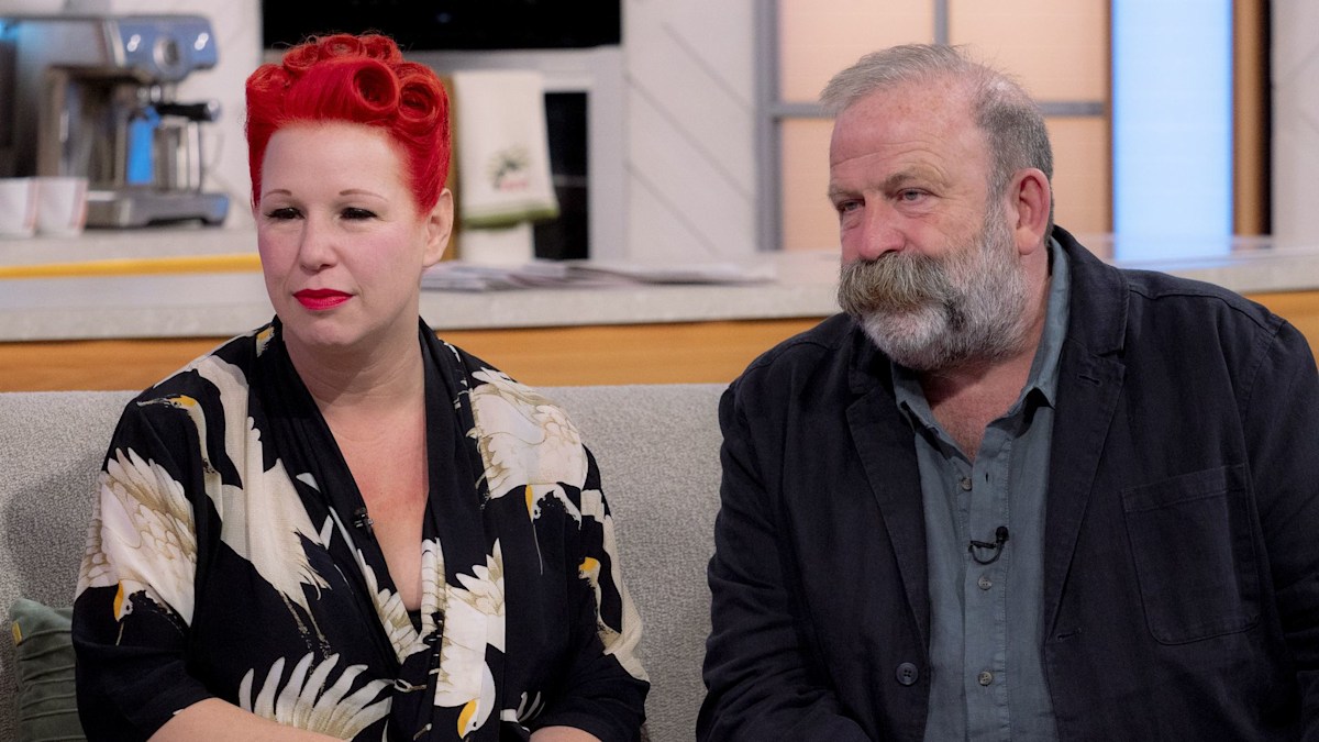 Dick and Angel Strawbridge supported by fans after leaving France