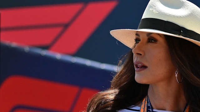 Catherine Zeta-Jones in a hat and striped top