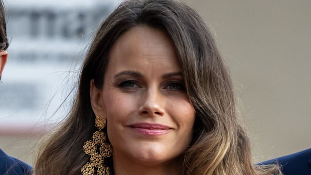 A photo of Princess Sofia wearing a red dress