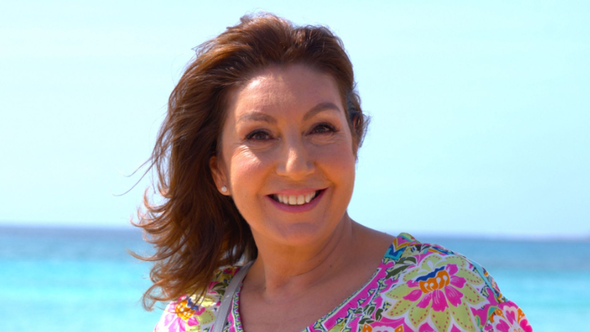 Jane McDonald in bright outfit