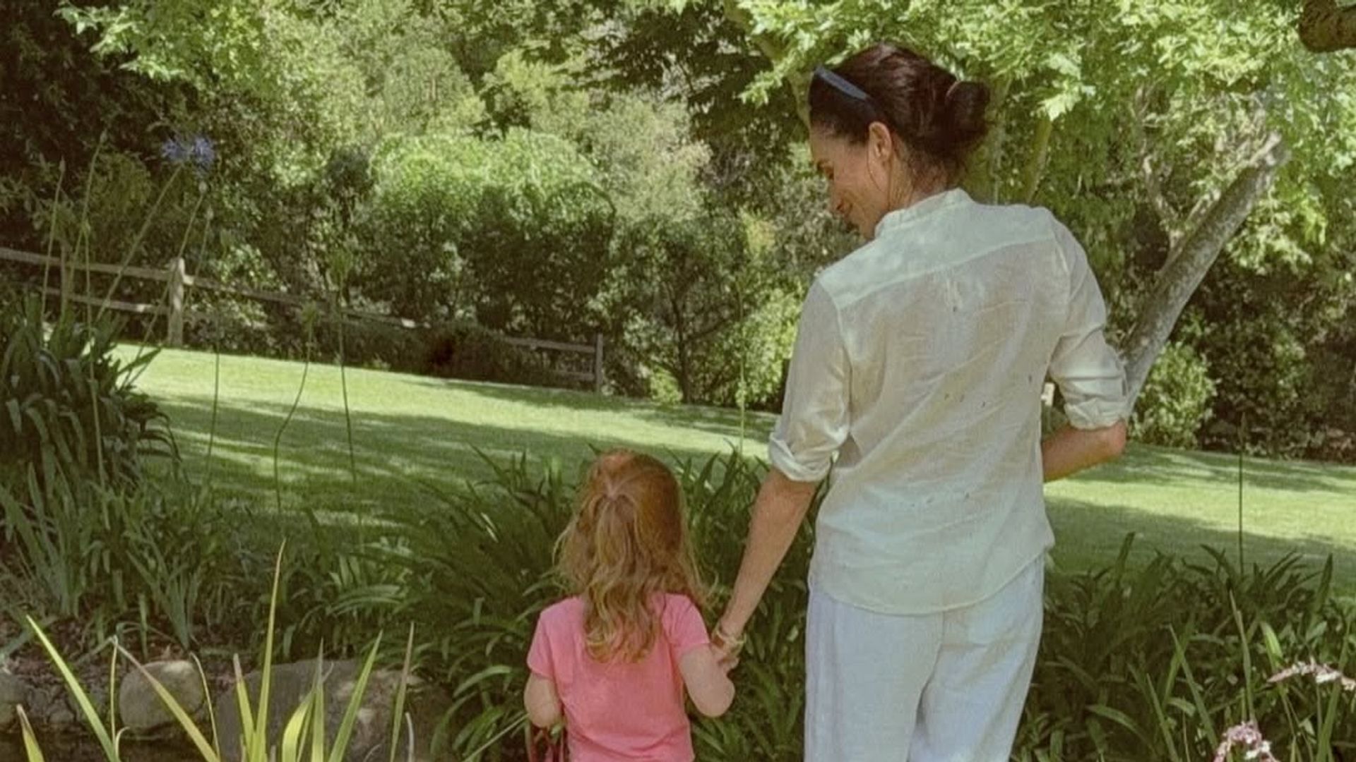 Meghan and Lilibet barefoot at home