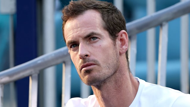 Andy Murray watches Novak Djokovic play Sebastian Korda during the Miami Open
