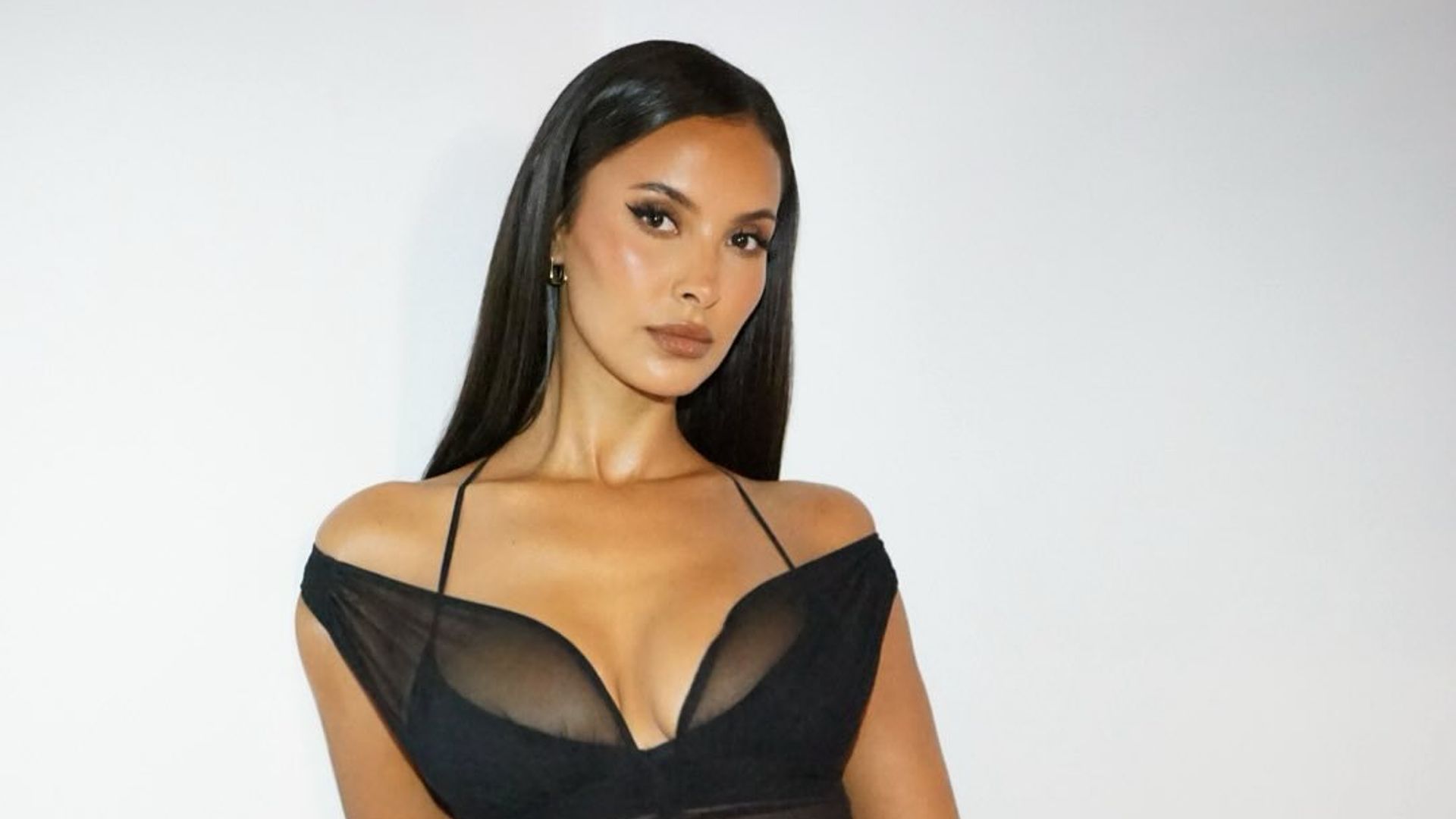 Maya Jama goes goth in lowrise black leather and mesh