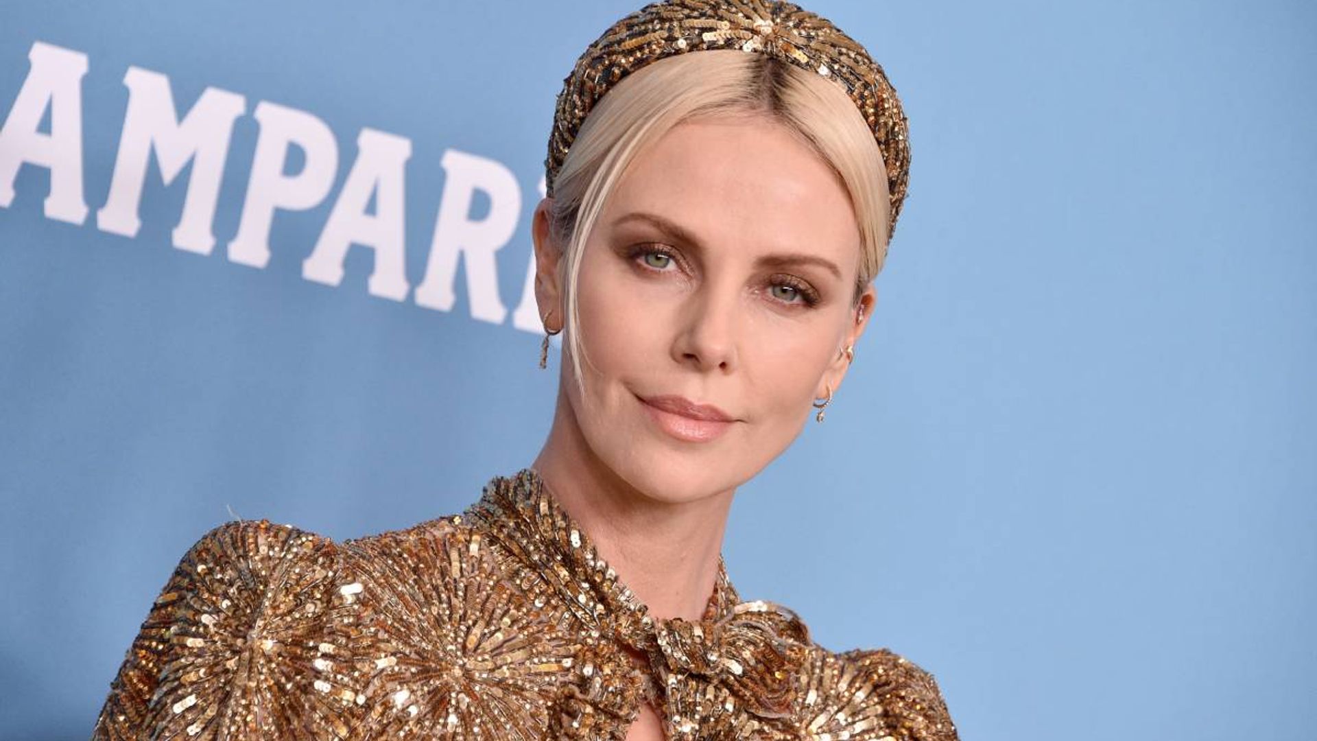 Charlize Theron’s neon sneakers will be at the top of your wish list