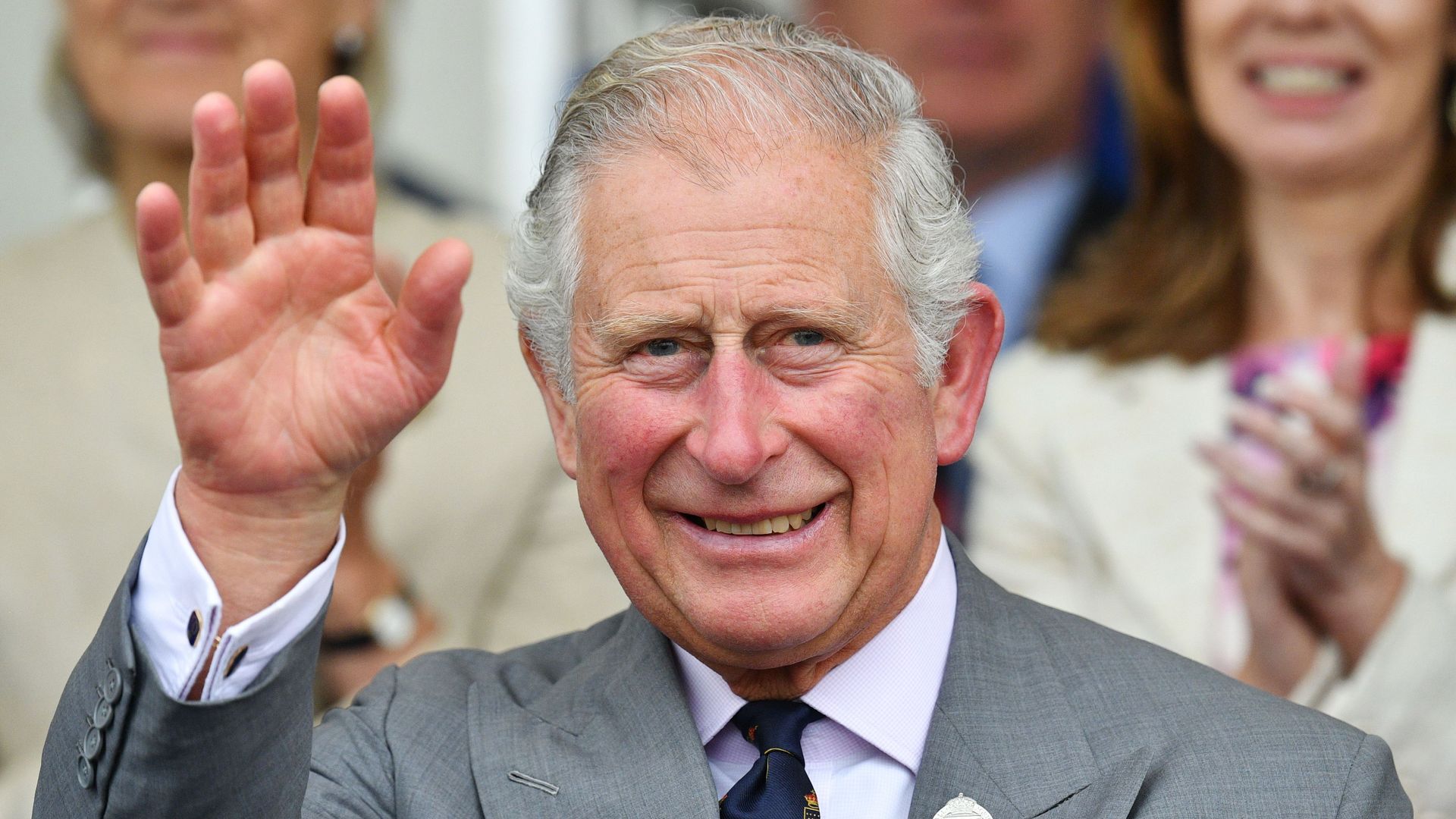 King Charles waves to crowds in 2018