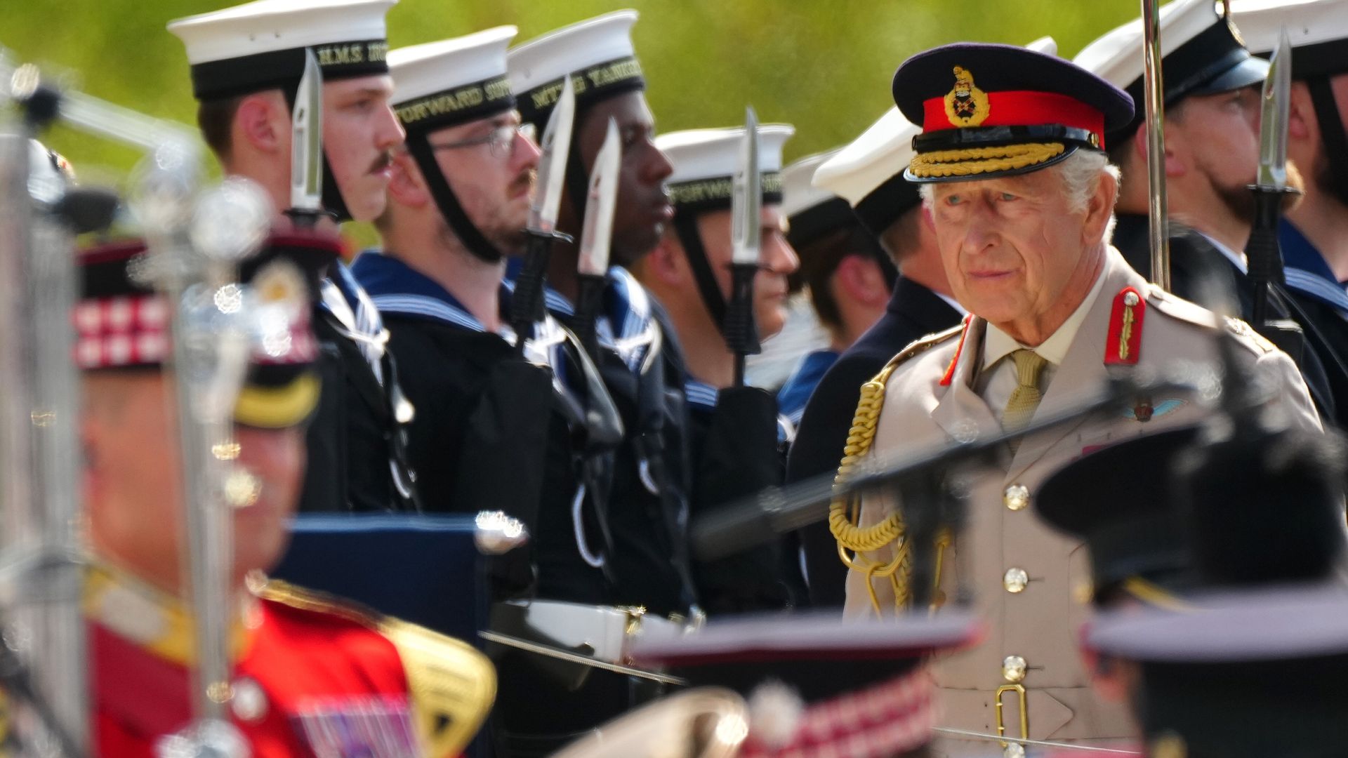 King Charles III looks on as he attends the Service of Remembrance to commemorate the 80th Anniversary of VJ Day at The National Memorial Arboretum