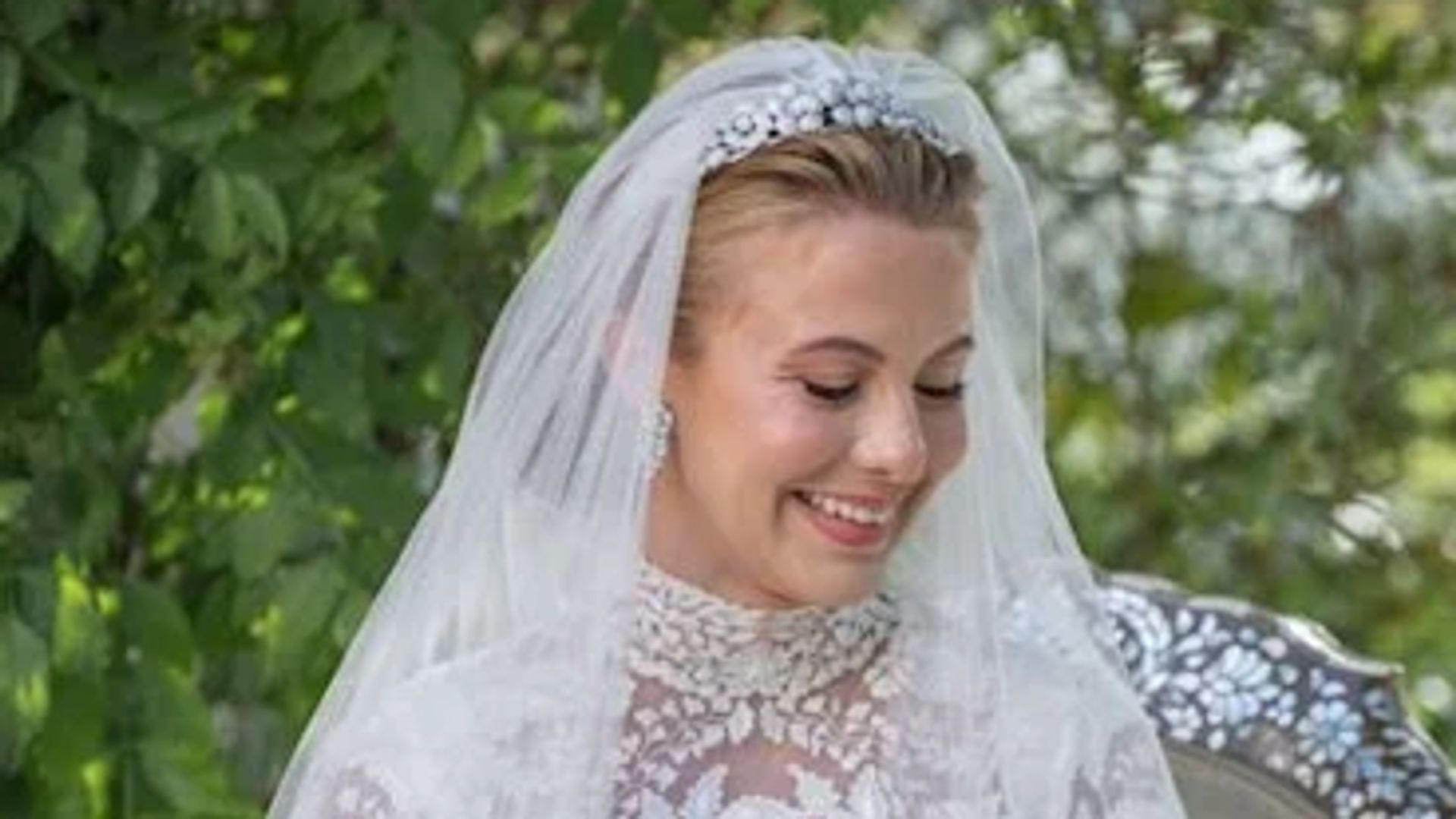 princess aisha and husband exchanging rings on wedding day