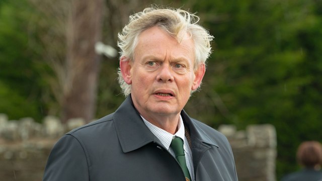 man in black coat 