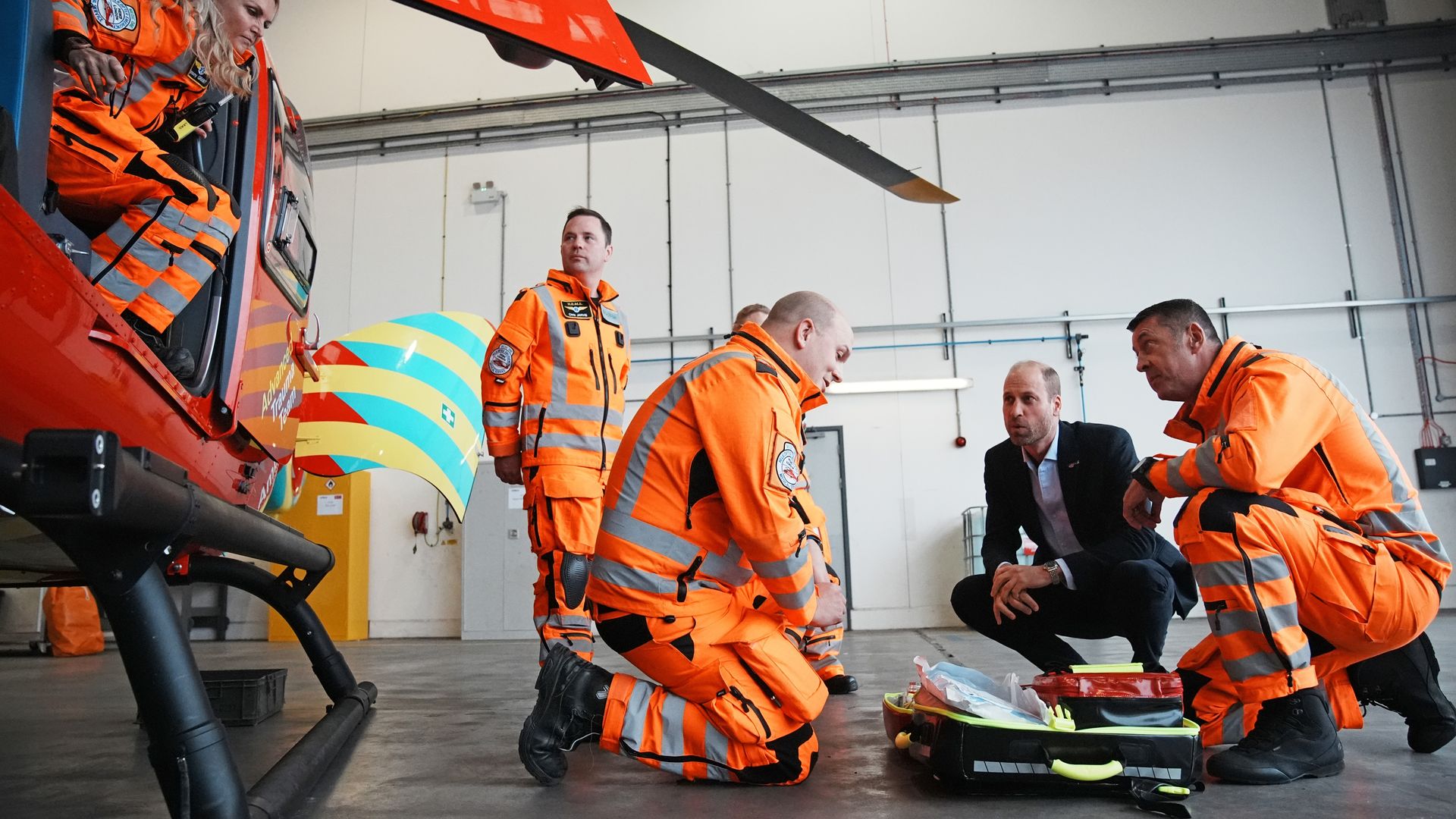 air ambulance crew with medicak kit bag