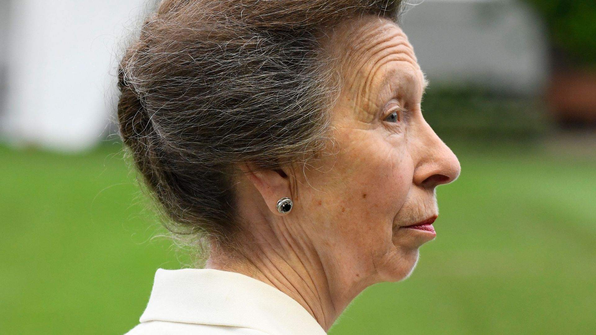 Princess Anne from the side wearing white