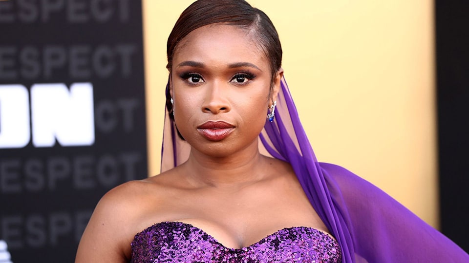 Jennifer Hudson's teen son almost towers over his mom during all