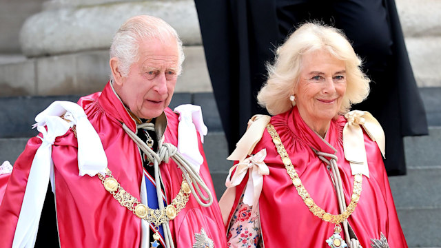  King Charles III and Queen Camilla walk down the steps of St Paul's Cathedral